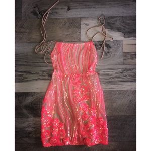 Backless pink mini dress